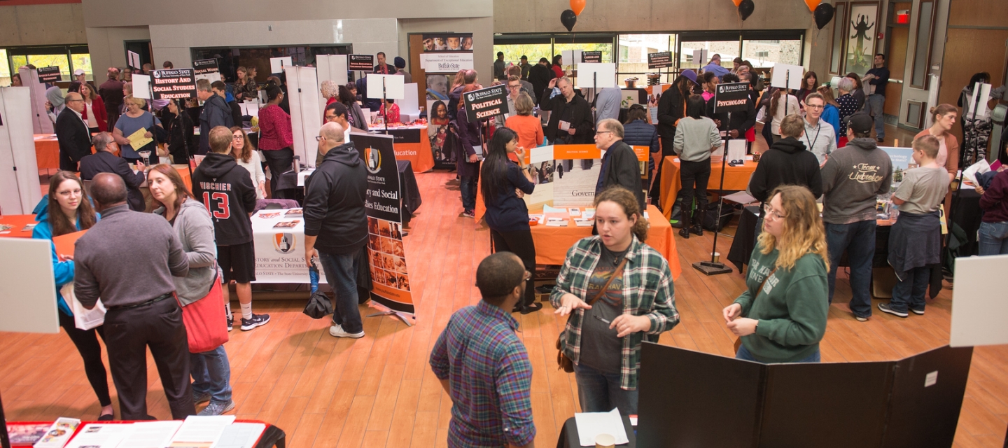 Students and faculty at open house event