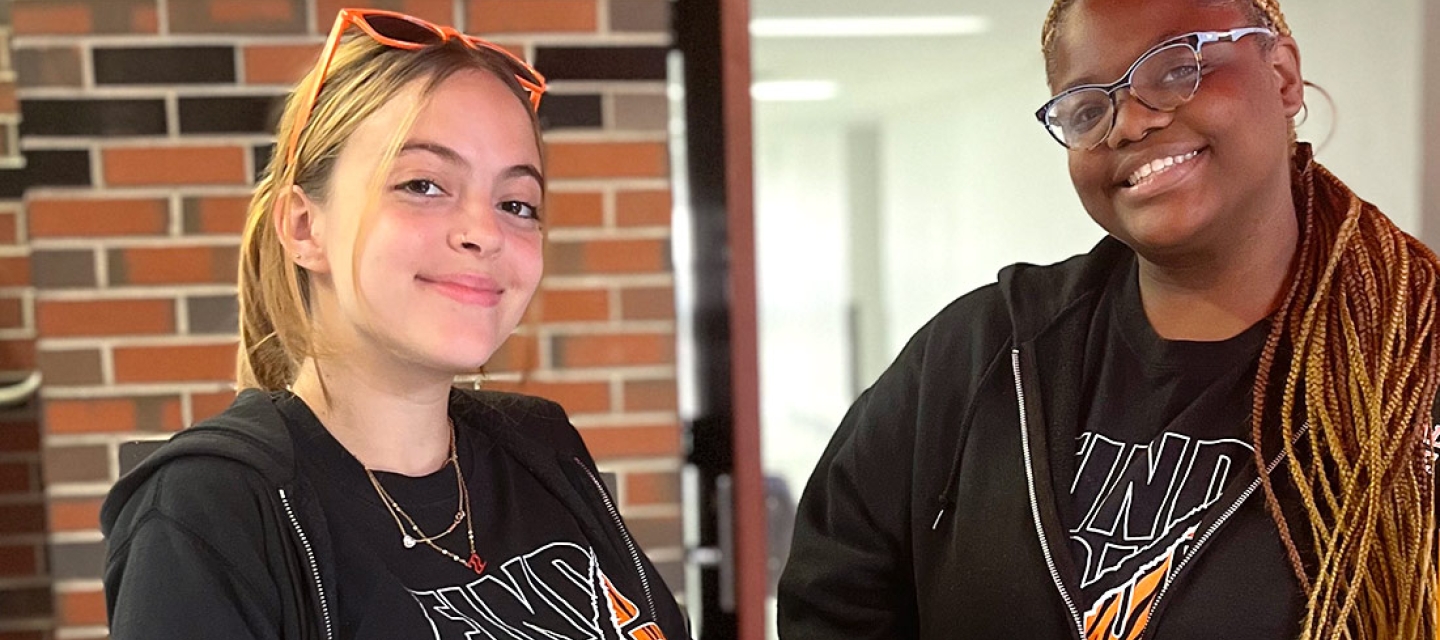Two smiling students